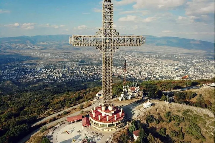 An impressive aerial view of the Millennium Cross overlooking the city of Skopje.